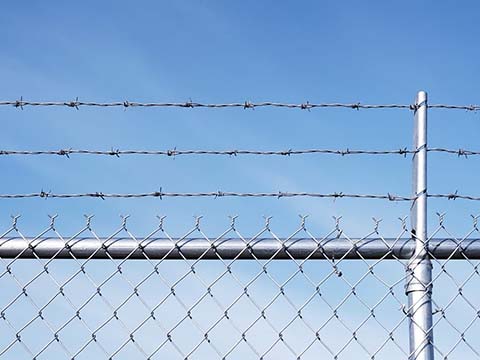 Chain Link Fence with Barbed Wire