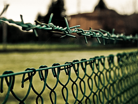 residential barbed wire fence