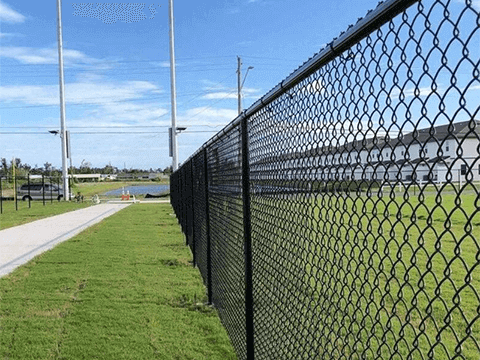 black chain link fence post