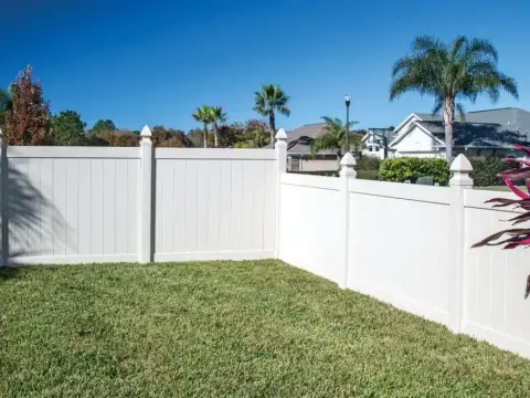 white aluminum fence