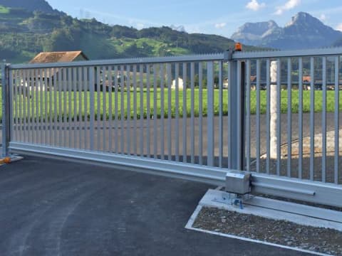 Primary color railing driveway gate