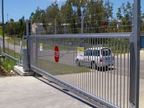 Sidewalk driveway gate