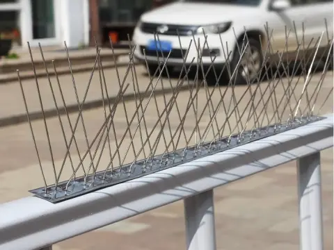 Parking lot fence top