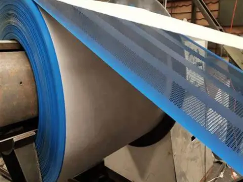 Blue hexagon perforated metal production