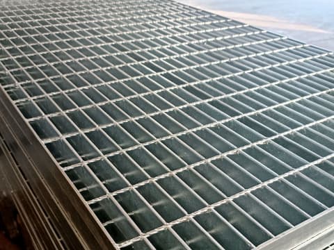 Welded stainless steel grille cover